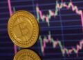 Bitcoin in calo a 61.000 dollari tra Fed e tensioni Medio Oriente